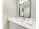 Bathroom features quartz countertop, square sink, and decorative statue at 2322 5Th E St, Palmetto, FL 34221