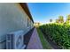 Exterior shot of a home with a manicured walkway and lush landscaping at 2322 5Th E St, Palmetto, FL 34221