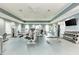 Bright gym featuring a variety of modern exercise equipment, weights, rubber flooring, and multiple windows at 2322 5Th E St, Palmetto, FL 34221