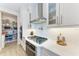 Modern kitchen features stainless steel appliances, white cabinets and subway tile at 2322 5Th E St, Palmetto, FL 34221