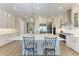 Bright kitchen with quartz countertops, stainless appliances, and pendant lighting at 2322 5Th E St, Palmetto, FL 34221