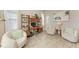 Cozy living room featuring comfortable seating, a work desk, and stylish decor at 2322 5Th E St, Palmetto, FL 34221