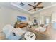 Open-concept living room with modern furnishings, a decorative mirror, and sleek design at 2322 5Th E St, Palmetto, FL 34221