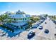 Exterior aerial view of a hotel near local shops, restaurants, and the Tampa Bay beach at 256 144Th Ave, Madeira Beach, FL 33708