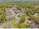 Scenic aerial view of a suburban neighborhood featuring modern townhomes and lush greenery at 2718 Chestnut Creek Pl, Brandon, FL 33510
