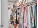 Well-organized closet with ample hanging space and overhead storage at 2718 Chestnut Creek Pl, Brandon, FL 33510