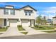 A daytime exterior view of the home at 2716 Olive Brook, Wesley Chapel, Florida at 2718 Chestnut Creek Pl, Brandon, FL 33510