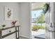 Clean foyer with a view of the street through the open front door at 2718 Chestnut Creek Pl, Brandon, FL 33510