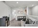 The upstairs sitting area is bright and features stylish decor and furniture at 2718 Chestnut Creek Pl, Brandon, FL 33510