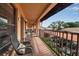 Spacious balcony featuring comfortable seating and views of the community parking area at 2808 60Th W Ave # 1722, Bradenton, FL 34207