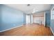 Spacious bedroom featuring laminate floors, closet, and an ensuite bath at 3011 Bougainvillea St, Sarasota, FL 34239