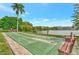 Enjoy this serene community shuffleboard court near the lake. Perfect for outdoor relaxation and recreation at 3525 Lake Bayshore Dr # 103J, Bradenton, FL 34205