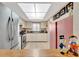 Spacious kitchen with ample counter space, natural light, and tile flooring at 3525 Lake Bayshore Dr # 103J, Bradenton, FL 34205