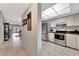 Open-concept kitchen with modern appliances and easy access to living area at 3525 Lake Bayshore Dr # 103J, Bradenton, FL 34205