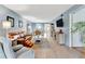 Bright and airy living room featuring a seamless flow into the dining area at 3525 Lake Bayshore Dr # 103J, Bradenton, FL 34205