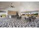 Open clubhouse with a large seating and bar area, providing ample space for gatherings at 3677 Turning Tides Ter, Bradenton, FL 34208