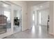 Bright entryway featuring tile floors and an opening to the study room and the main living area at 3677 Turning Tides Ter, Bradenton, FL 34208