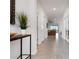 Entryway with tile flooring leading into a spacious living area with plenty of natural light at 3677 Turning Tides Ter, Bradenton, FL 34208