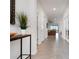 Inviting hallway leading to the living room with stylish decor at 3677 Turning Tides Ter, Bradenton, FL 34208
