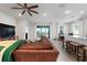 Spacious living room with stylish seating and view to the patio at 3677 Turning Tides Ter, Bradenton, FL 34208