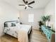 Bright bedroom features a ceiling fan, light color walls, and complementary furniture at 4 Braden Castle Dr, Bradenton, FL 34208