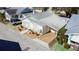 Aerial image showing a charming single-story home with a well maintained yard at 4 Braden Castle Dr, Bradenton, FL 34208