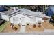 Aerial view of a well kept single story home with updated gravel landscaping and clean curb appeal at 4 Braden Castle Dr, Bradenton, FL 34208