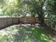 This backyard with a seating area offers an outdoor space for relaxation and entertainment at 4031 Iola Dr, Sarasota, FL 34231