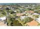 Aerial view of a community featuring mature trees and waterways at 417 Tortuga Dr, Nokomis, FL 34275