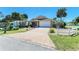 Charming single-story home featuring a two-car garage, well-maintained landscaping and a brick driveway at 417 Tortuga Dr, Nokomis, FL 34275