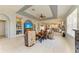 Open-concept living room featuring tile flooring and abundant natural light at 417 Tortuga Dr, Nokomis, FL 34275