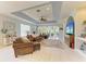 Bright and spacious living room with tile floors and lots of natural light at 417 Tortuga Dr, Nokomis, FL 34275