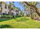 Expansive backyard offering serene views and plenty of space for outdoor activities at 4480 Cinnamon Dr # 2408, Sarasota, FL 34238