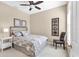 Cozy bedroom with neutral tones, a ceiling fan, and comfortable furnishings at 4480 Cinnamon Dr # 2408, Sarasota, FL 34238