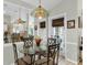 Dining room features a glass table with room for four at 4627 Breezy Pines Blvd, Sarasota, FL 34232