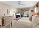 Bright and airy main bedroom with a king-sized bed and sliding doors to a lanai overlooking a lake at 4627 Breezy Pines Blvd, Sarasota, FL 34232