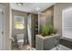 Updated bathroom includes a tub/shower combo, neutral tile, and a sleek vanity for a fresh design at 4711 Placid Cir, Sarasota, FL 34231