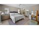 Bright bedroom offers natural light, neutral tones, and a spacious layout for a serene retreat at 4711 Placid Cir, Sarasota, FL 34231