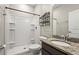 Bathroom with granite countertop, shower, and neutral colors at 5085 Ivory Stone Dr, Wimauma, FL 33598