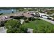 Aerial view of clubhouse, showcasing lush landscaping and meticulously maintained grounds at 5211 Mahogany Run # 113, Sarasota, FL 34241