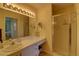 Full bathroom with a stand up shower and white vanity at 5211 Mahogany Run # 113, Sarasota, FL 34241