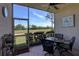 View from the screened in patio looking out at the golf course at 5211 Mahogany Run # 113, Sarasota, FL 34241