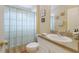 Cozy bathroom featuring a shower/tub combination, vanity, framed decor, and tiled floors at 5227 Lansdowne Way, Palmetto, FL 34221