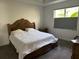 Comfortable bedroom with a queen-sized bed, and soft lighting, creating a relaxing atmosphere at 5262 Asher Ct, Sarasota, FL 34232