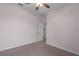Neutral bedroom featuring plush carpeting and a doorway to another room at 5412 72Nd E Ter, Ellenton, FL 34222