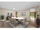 Bright dining room featuring contemporary decor, modern lighting, and a stylish white marble table at 5412 72Nd E Ter, Ellenton, FL 34222