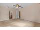 Spacious carpeted main bedroom with access to the bathroom and walk-in closet at 5412 72Nd E Ter, Ellenton, FL 34222