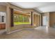 Sun room with tiled floor, bay window and sliding glass doors for relaxing at 5412 72Nd E Ter, Ellenton, FL 34222