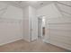 Walk-in closet with wall-to-wall white wire shelving at 5412 72Nd E Ter, Ellenton, FL 34222