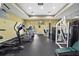 Well-equipped fitness center featuring modern cardio machines and weightlifting equipment for residents' use at 5450 Bentgrass Dr # 5-301, Sarasota, FL 34235